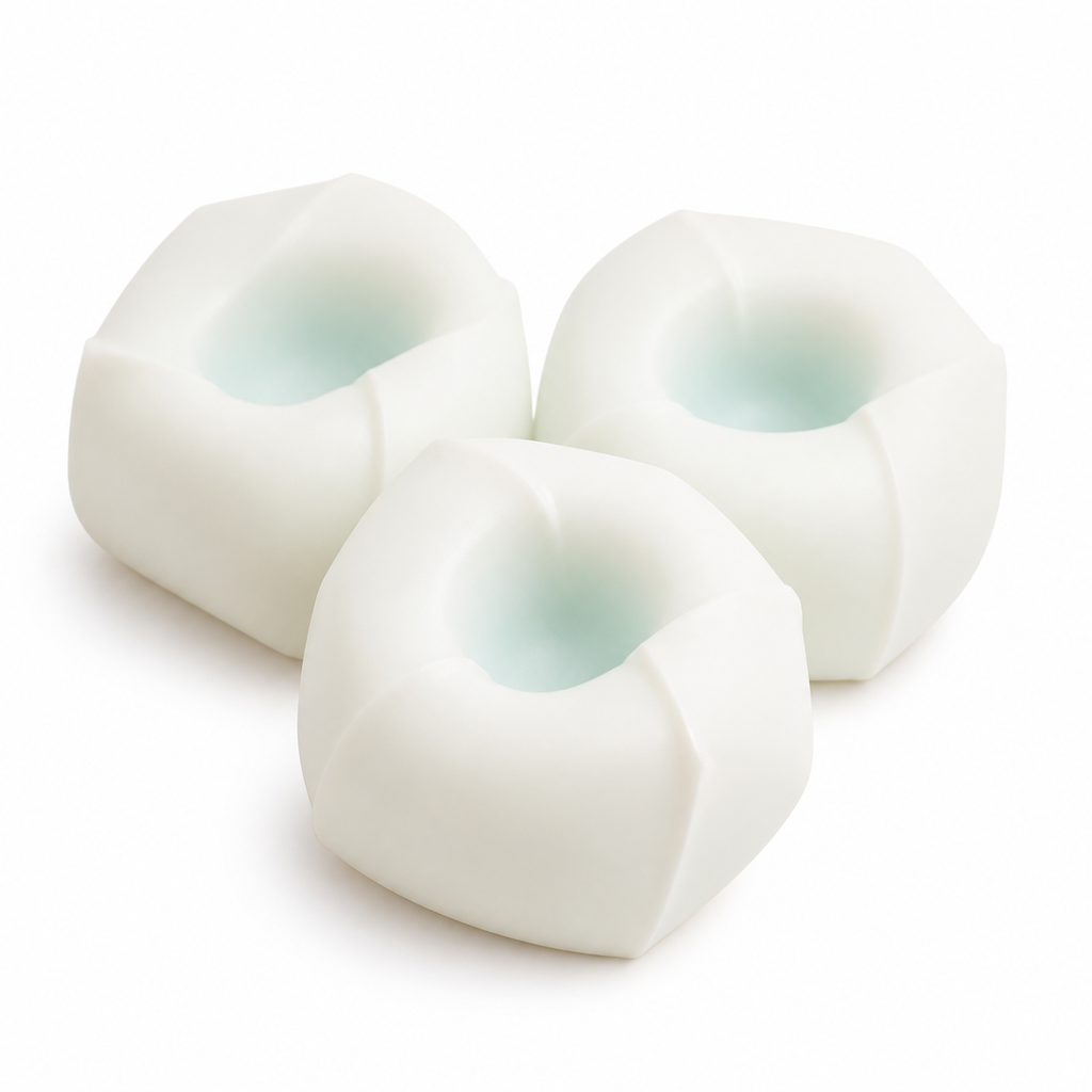 Tofu mochi squishy stress balls on a clean warm white background