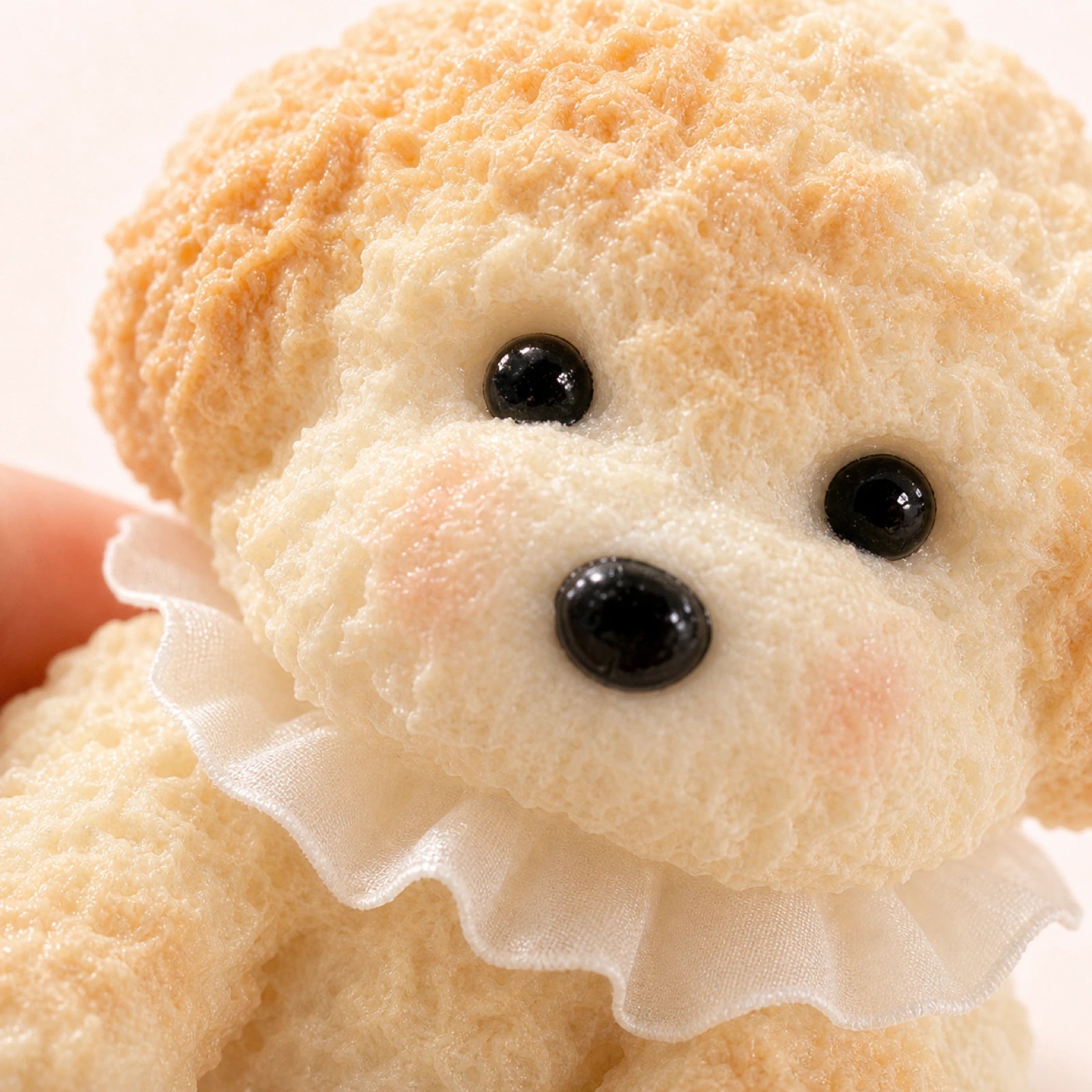 Close-up of handmade squishy dog toy texture and ruffle collar