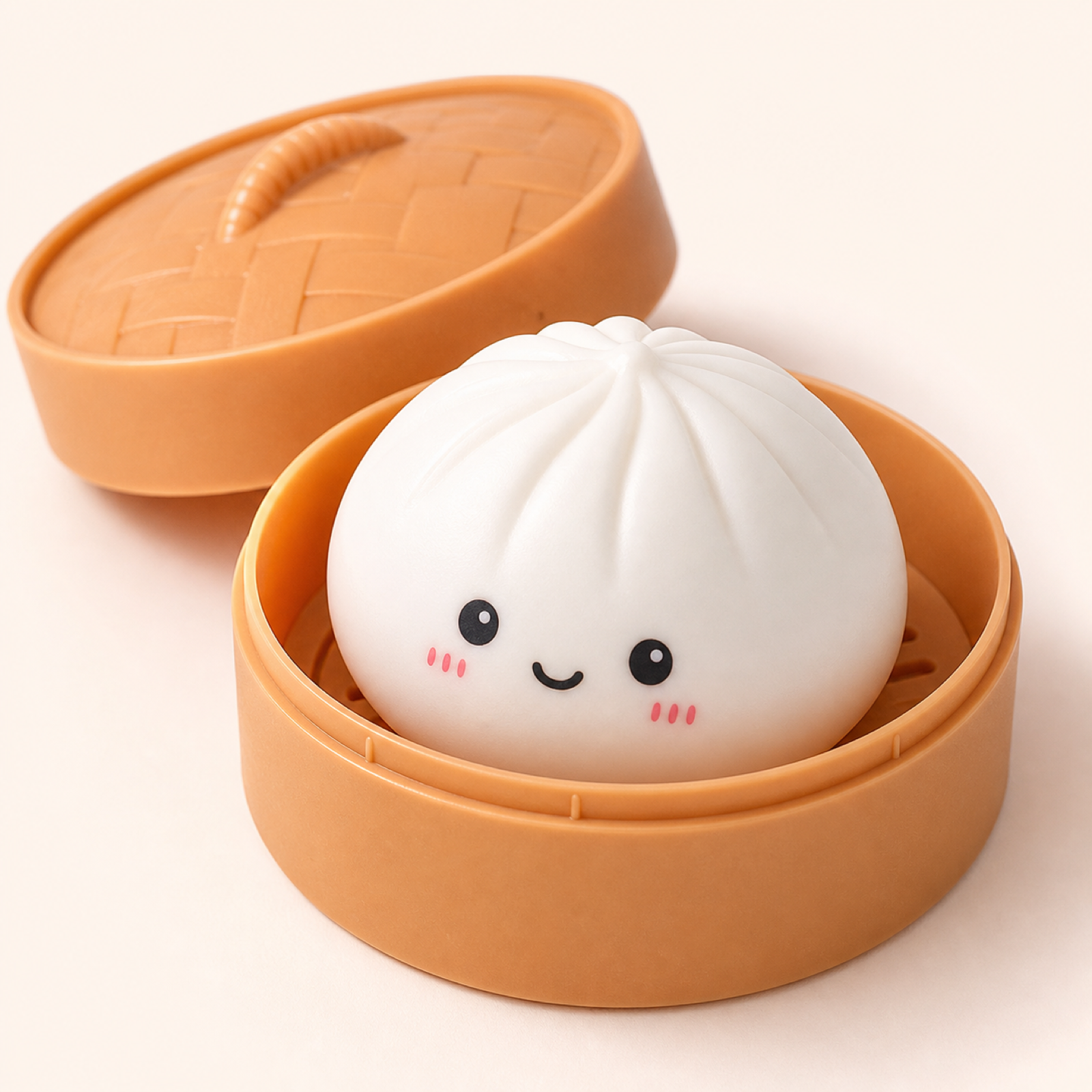 Cute dumpling squishy stress ball in a tan storage box on a clean background
